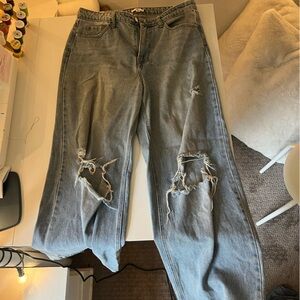 Mid waist wide leg jeans with knee rips